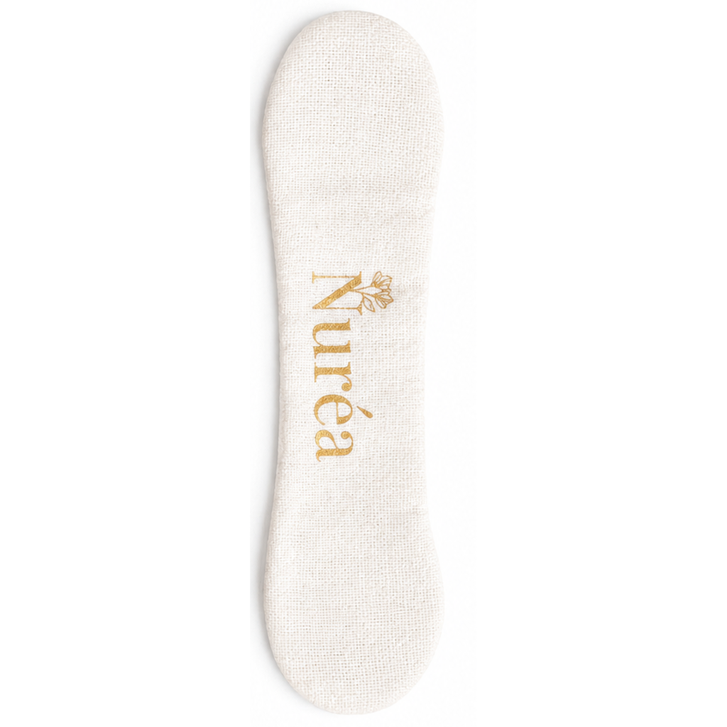 The Nurture Clip in Linen, a magnetic breastfeeding side reminder by Nuréa